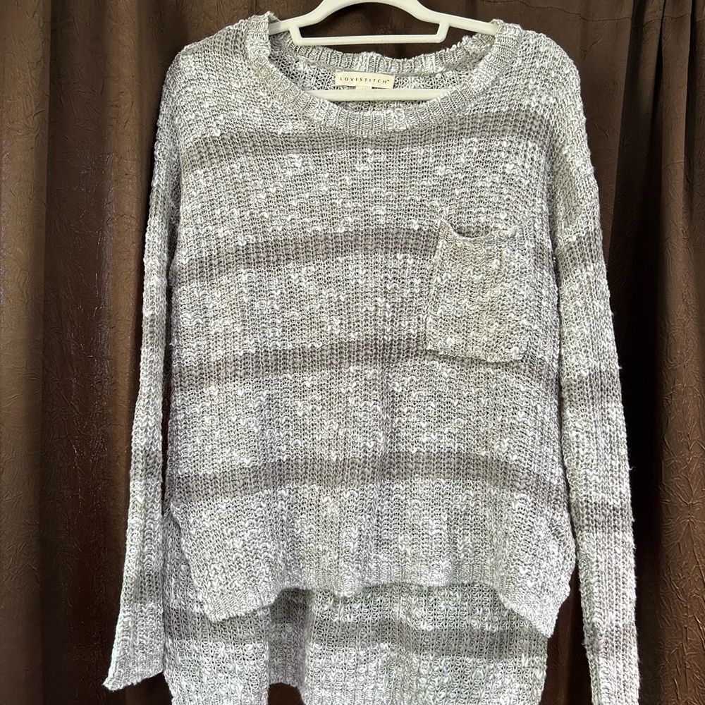 Grey striped detail sweater.
